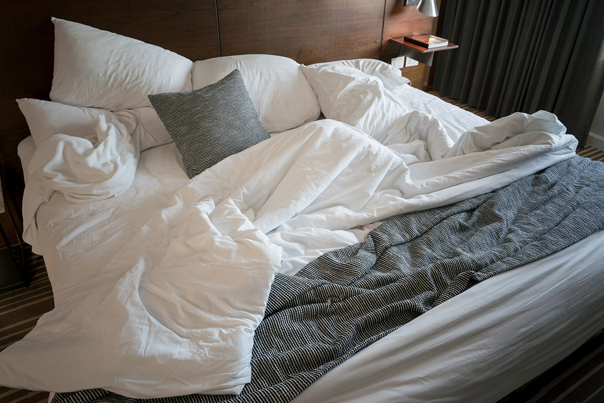 Messy hotel bed