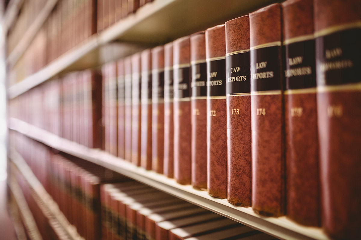 A row of law books in a bookshelf