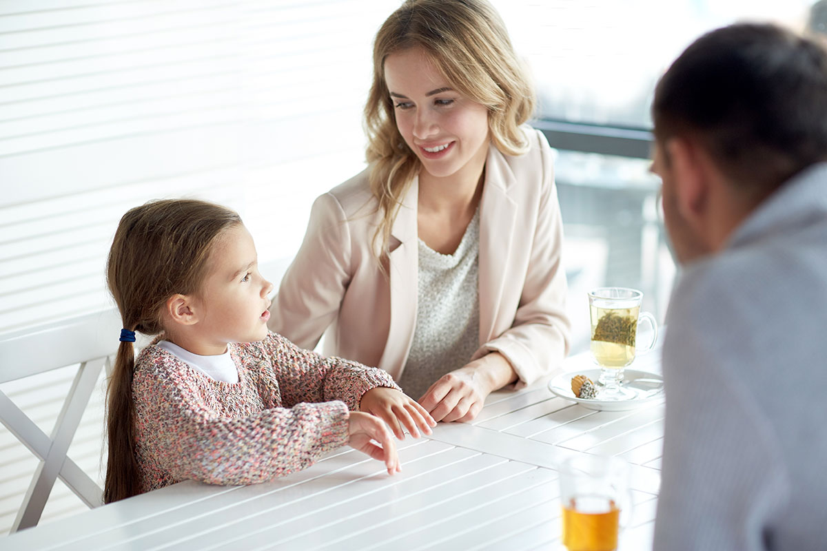 Parents talking with daughter